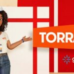 A Aurora, assistente virtual da Torra, está usando um chapeu de Papai Noel para divulgar as vagas temporárias de Natal