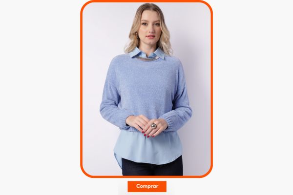 Mulher usando suéter azul sobre camisa clara