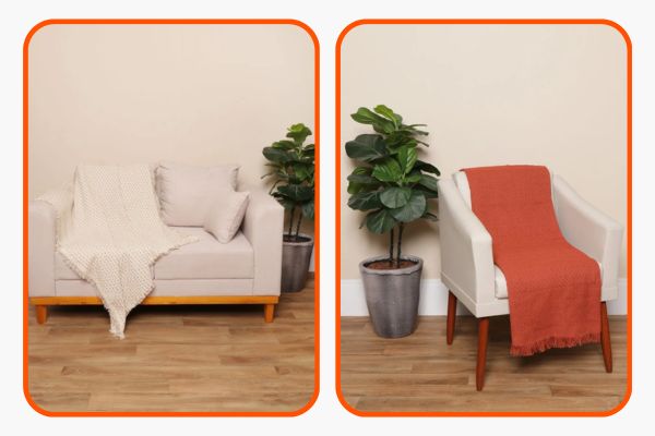 Sofá e poltrona decorados com mantas