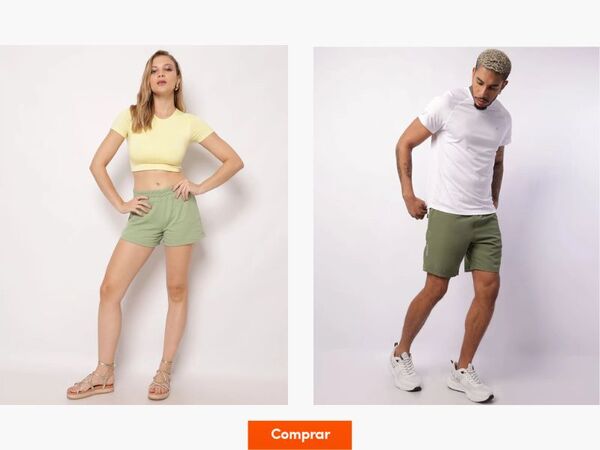 Modelos usando shorts verde em estúdio.